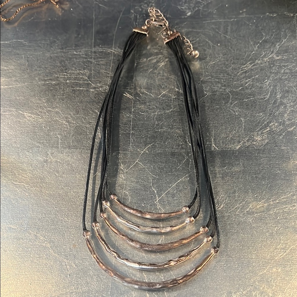 Multi-Strand Black leather and hammered Necklace with Curved Metal Design